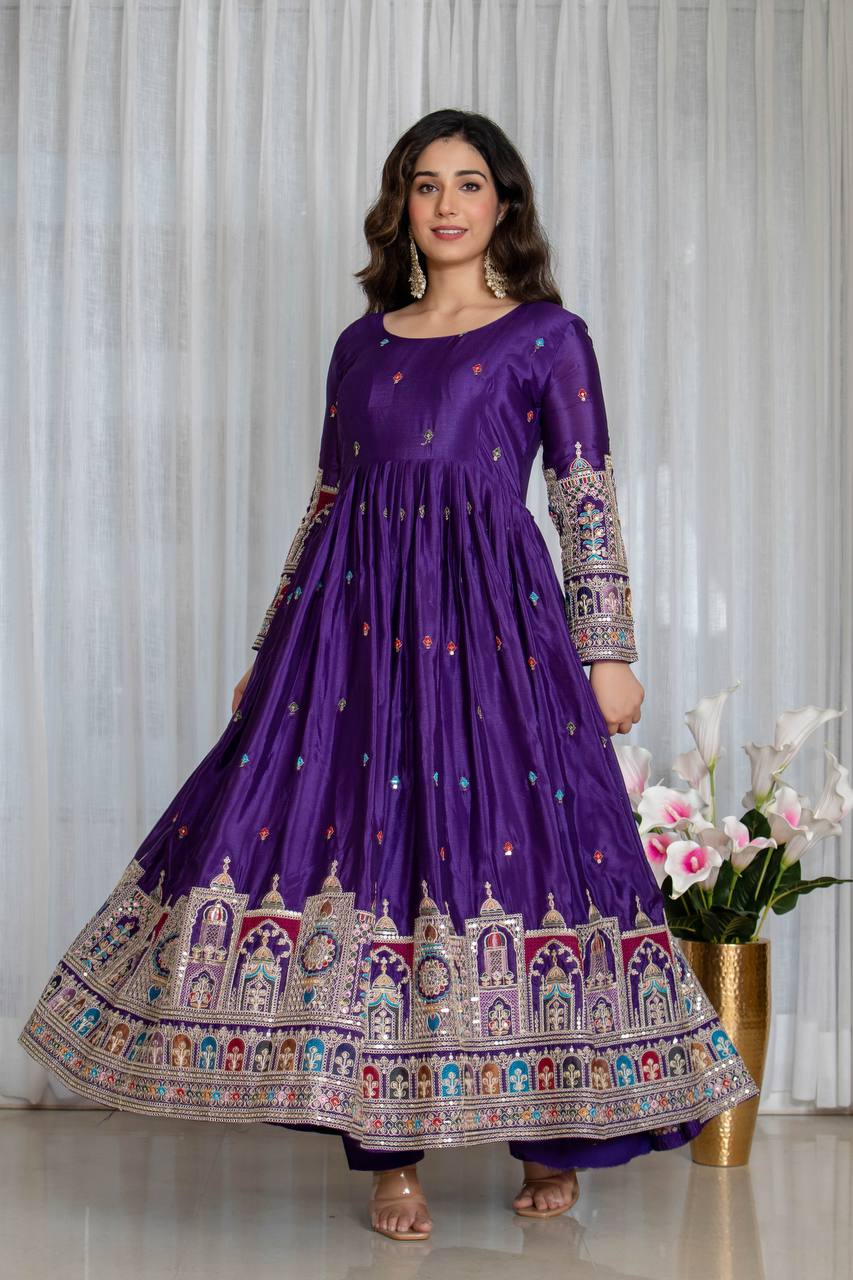 Purple Elegant Pure Chinnon Silk gown set, designed with rich embroidery and a flawless fall