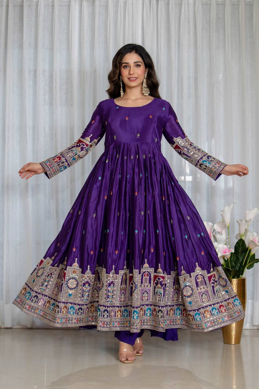Purple Elegant Pure Chinnon Silk gown set, designed with rich embroidery and a flawless fall